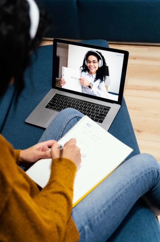 high-angle-teenage-girl-with-headphones-during-online-school-1-p-800